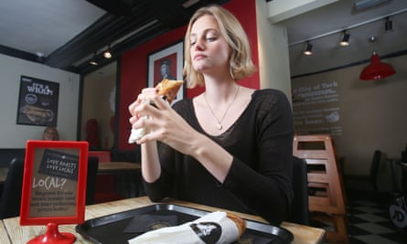 Journalist, Frances Perraudin, tries a yorkshire pudding wrap.