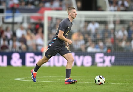 England’s Adam Wharton with the ball at his feet.