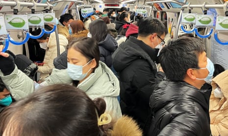 Commuters ride a subway train during the morning rush hour amid the coronavirus disease outbreak in Beijing.