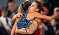 Paula Badosa and Aryna Sabalenka embrace on court at the end of their match.