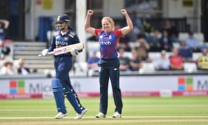 Freya Davies celebrates after getting Smriti Mandhana out.