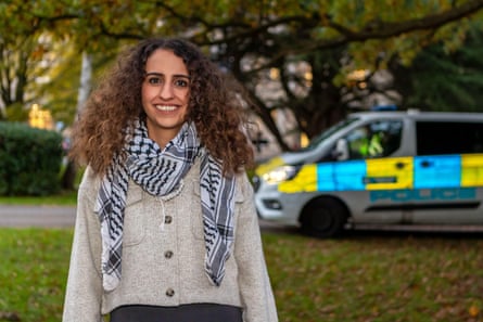 Huda Ammori, the co-founder of Palestine Action, on grass wearng