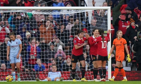 Manchester United’s Rachel Williams (third right) celebrates with teammates after scoring her side's fifth goal of the game