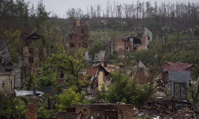 Destroyed houses in the village of Bohorodychne, eastern Ukraine