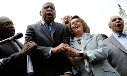 John Lewis sings along with house minority leader Nancy Pelosi and other Demcrats after their sit-in over gun-control law on Capitol Hill in Washington in 2016.