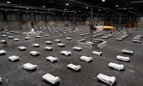 Beds arranged at a military field hospital at an exhibition complex in Madrid.