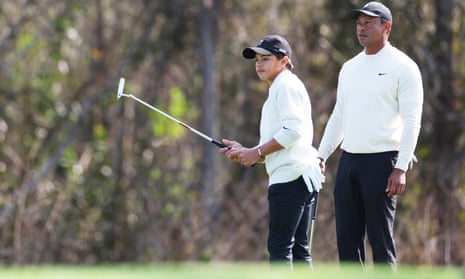 Charlie and Tiger Woods during a round in Orlando last year