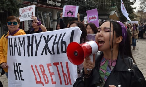 Women take part in a rally to mark the International Women's Day in Bishkek on March 8, 2023.