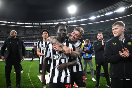 Garang Kuol celebrates with Harrison Ashby during the post-season friendly match between Tottenham Hotspur and Newcastle United at the MCG in 2024.