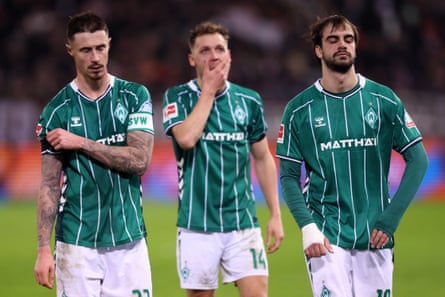 Werder Bremen players look sad.