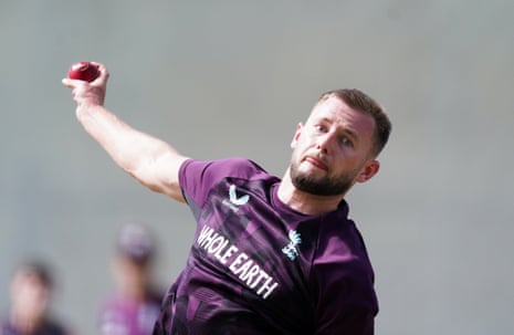 Gus Atkinson bowls during a nets session at Perth Stadium