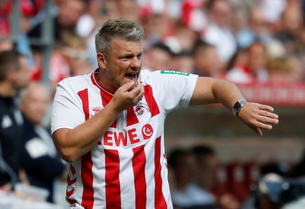 Lukas Kwasniok wearing a Köln garment connected nan touchline.