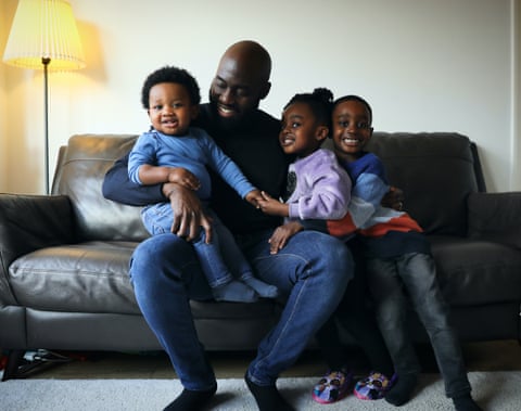 Dr. Raphael Sofoluke and his three children