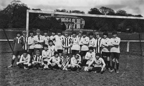 Members of Dick, Kerr Ladies and the France international team pose together before their match in April 1920.