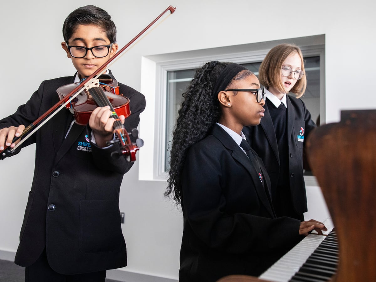 Banging the drum for music education: the UK school run with an orchestra