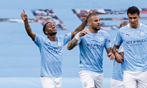 Raheem Sterling celebrates scoring Manchester City’s opening goal