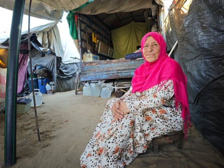 Mansoura Ibrahim Mohammed Abdel Dayem, pictured successful beforehand of the flatbed motortruck wherever she present lives.