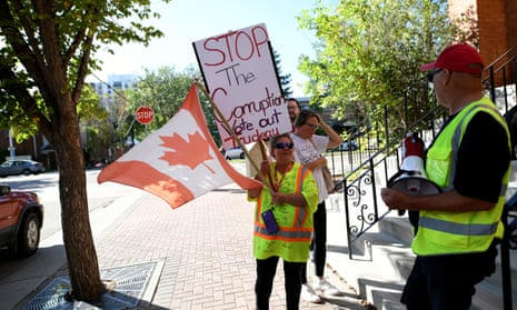 A few protesters demonstrate as Canada’s prime minister, Justin Trudeau, holds a Liberal party election campaign event in Edmonton, Alberta, in September.