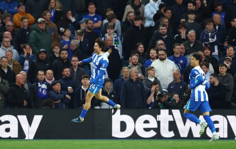 Brighton & Hove Albion’s Ferdi Kadioglu leaps in the air as he celebrates opening the scoring.