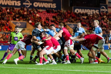 Javan Sebastian of Cardiff is pushed back during a maul against Scarlets