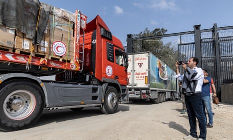 The second convoy of aid trucks crosses the Rafah border from the Egyptian side on October 22, 2023.
