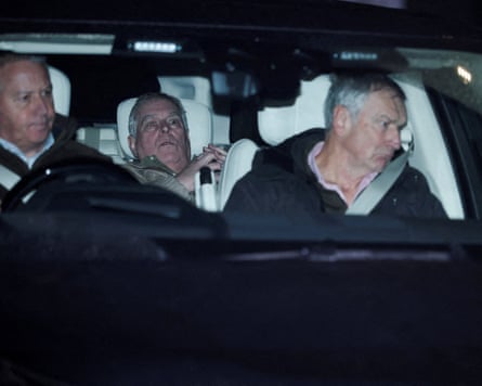 Andrew Mountbatten-Windsor slumps in back of car while being driven away