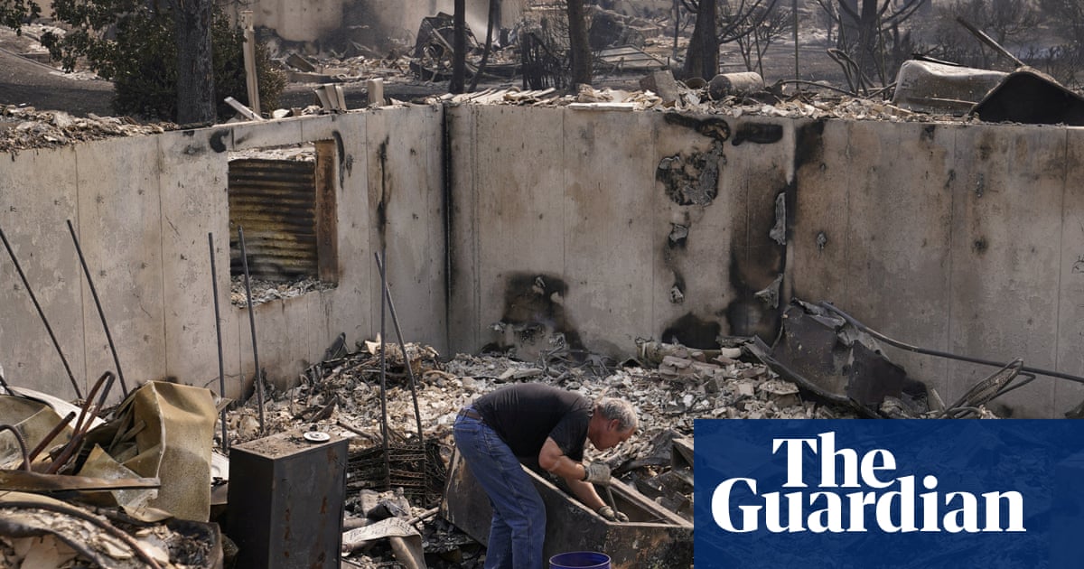 Raging Washington state wildfires destroy homes and force 60,000 people to evacuate