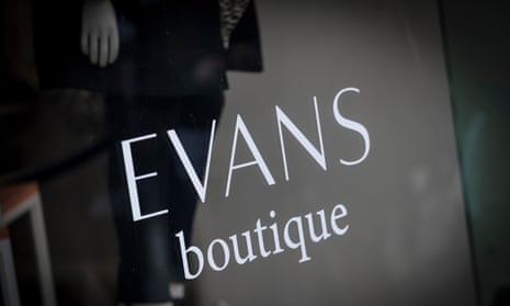 A sign and logo for Evans boutique store