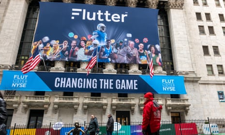 A banner outside the New York Stock Exchange for the IPO of Flutter Entertainment.