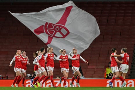 Teammates celebrate after Arsenal's Swedish striker #25 Stina Blackstenius