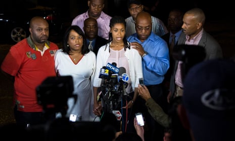 Valarie Carey, second left, speaks to the media alongside other family members in Brooklyn in 2013 about the police killing of her sister Miriam Carey.