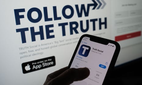 ‘Abusing truth as only he can’: a smartphone user checks the app store for Truth Social