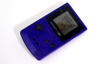 Pokémon on a vintage Game Boy Color console, introduced in 1998.