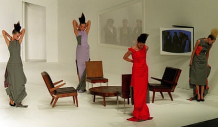 Models wear creations from designer Hussein Chalayan’s Autumn/Winter 2000 collection, where a table was transformed into a skirt.