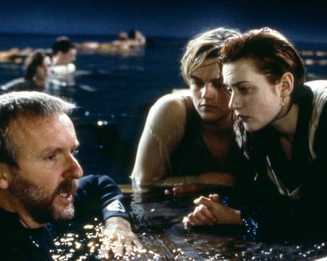 Room for a third? Director James Cameron with Kate Winslet and Leonardo DiCaprio on the Titanic door during filming.