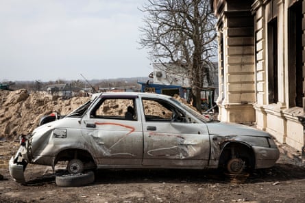 A car with the letter Z, a symbol of support for the Russian invasion of Ukraine, near the train station in Trostianets, occupied by the Russian army and heavily damaged by the Ukrainian army when it recently retook the town.