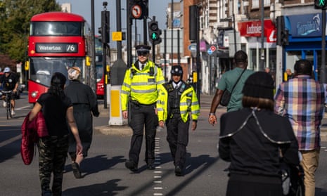 Police walking through London street