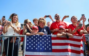 A closely packed crowd of Trump supporters, most without masks, listen to U.S. President Donald Trump speak to the crowd after arriving at Tampa International Airport, on a day when the state of Florida registered and announced 257 new COVID-19 fatalities, a record increase in coronavirus disease deaths for the fourth straight day in a row, in Tampa, Florida, U.S., July 31, 2020.