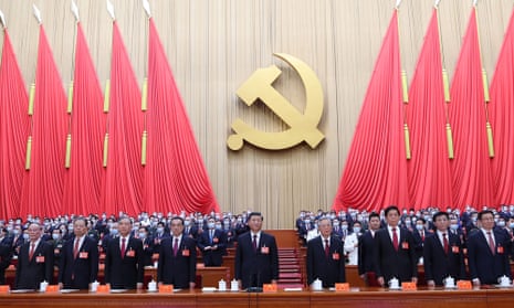Xi Jinping, center, and other officials at the closing ceremony