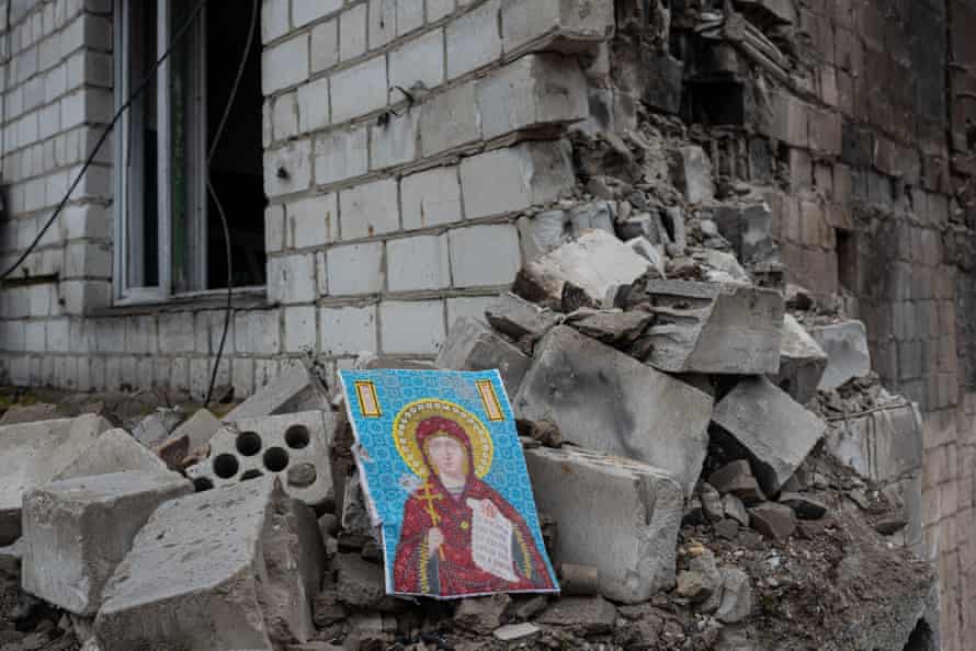 A handmade picture of Virgin Mary is seen among the rubble of a destroyed apartment building in Borodianka, Ukraine.