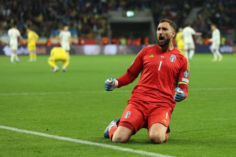 Italy's goalkeeper Gianluigi Donnarumma celebrates at the final whistle.