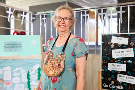 Jenefer Lowe, grand bard of Cornwall, stands in a school with Cornish language signs on display