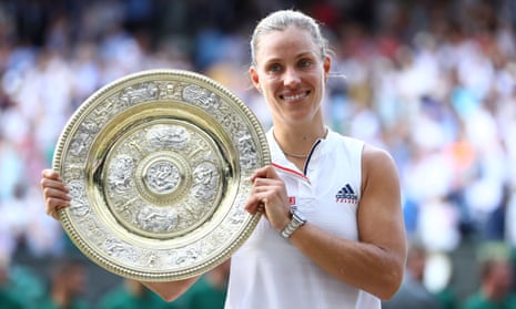 Angelique Kerber poses with the Venus Rosewater Dish after defeating Serena Williams 6-3, 6-3 in their Wimbledon singles final.