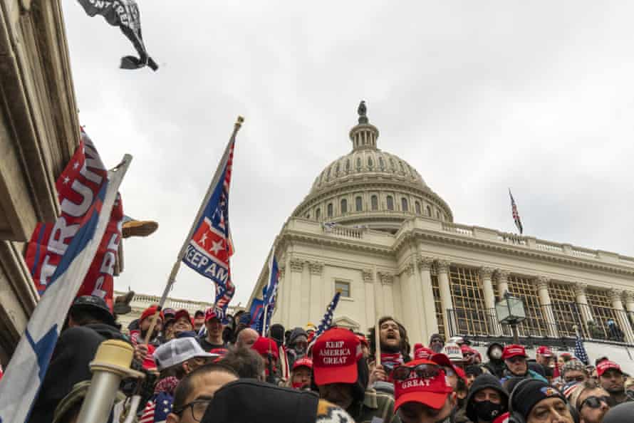 Trump rioters breach the security perimeter and penetrate the United States Capitol.