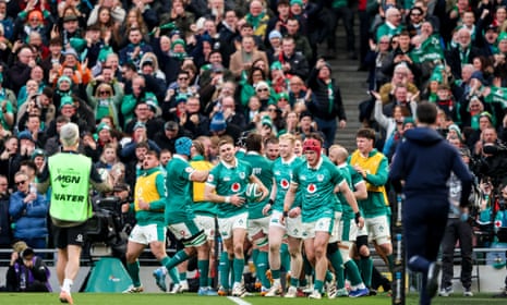 The Irish team celebrate after a try.