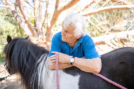 Roberts, who is determined to keep carriage driving, rests on her pony