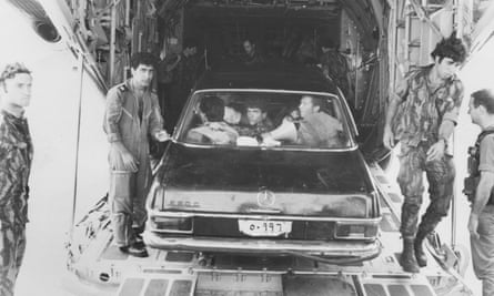 Soldiers return to Israel in a black Mercedes used in the raid on Entebbe, July 1976