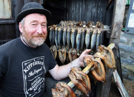 Mike Smylie smokes fish in his traditional smokehouse by the harbour at Clovelly, Devon.