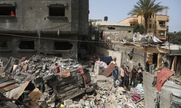 The aftermath of the Israeli strike on a house in Nuseirat refugee camp.