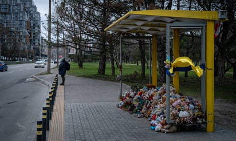 An improvised memorial of cuddly toys at a bus stop, commemorating the victims of a Russian rocket attack in Dnipro, Ukraine